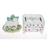 Porcelain child's money box (Thomas Sweeting) 1869, 12cm, and a Staffordshire sheep figure,