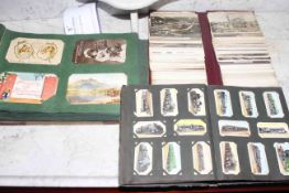 Vintage postcards and cigarette cards including Guisborough, Christmas Greetings,