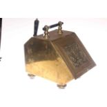 Brass ornate coal box with shovel,