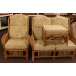 Cane conservatory two seater settee,