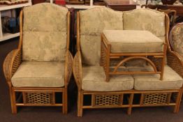 Cane conservatory two seater settee,