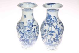 Pair of Oriental blue and white vases.