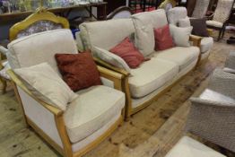 Ercol three piece lounge suite and footstool in light fabric