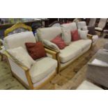 Ercol three piece lounge suite and footstool in light fabric