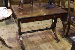 Regency mahogany sofa table having pairs of opposing drawers raised on pillar ends to four