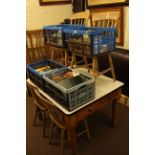 Pine two drawer kitchen table and four farmhouse style chairs