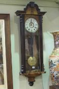 Victorian walnut and ebonised Vienna wall clock