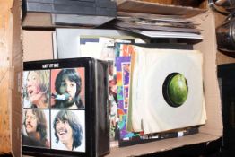 Box of Beatles memorabilia including Apple 7" records, sheet stamps,