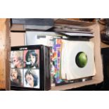Box of Beatles memorabilia including Apple 7" records, sheet stamps,