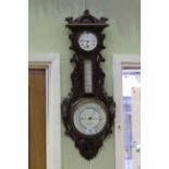 Negretti & Zambra carved oak clock-barometer