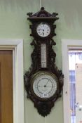 Negretti & Zambra carved oak clock-barometer