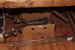 Box of swords and weaponry