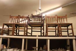 Set of five early 20th Century oak rail back dining chairs including one carver
