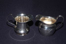Two silver cream jugs, Chester 1911 and Birmingham 1937,