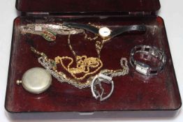 Estee Lauder box of costume jewellery including watches and a silver ingot