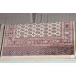 Bokhara carpet with a beige ground 2.30 by 1.