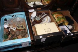 Three boxes of ornaments, glassware, barometer, watches, lighters, Ringtons boxed set,