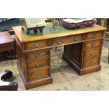 Stanley Cumper good quality oak nine drawer pedestal desk,