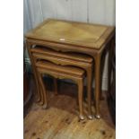 Nest of three Oriental hardwood tables on cabriole legs