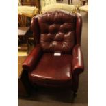Burgundy leather wing back armchair