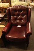 Burgundy leather wing back armchair