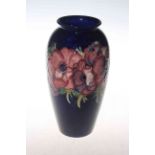 Large Moorcroft anemone vase on blue ground,