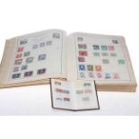 Stamp album including Penny Black and Middle East interest
