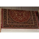 Keshan rug with a red ground 1.90 by 1.