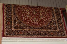 Keshan rug with a red ground 1.90 by 1.