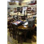 Early 20th Century oval mahogany Chippendale style extending dining table, two leaves and winder,