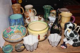 Charlotte Rhead bowl, jug and vase, Doulton jardiniere and jugs,