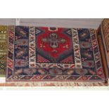 Persian design rug with a blue ground 1.70 by 1.