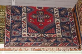 Persian design rug with a blue ground 1.70 by 1.