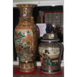 Two large Oriental vases, one with a lid,