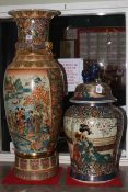 Two large Oriental vases, one with a lid,