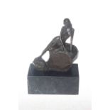 Bronze semi clad lady on a rock raised on a marble plinth