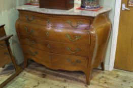 French marble topped four drawer chest of bombé form,