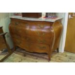 French marble topped four drawer chest of bombé form,