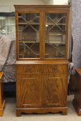 Astragal glazed four door mahogany cabinet bookcase