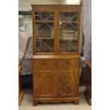 Astragal glazed four door mahogany cabinet bookcase