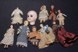 Nine dolls house dolls and bisque head,