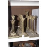 Twelve brass corinthian column oil lamp bases