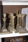 Twelve brass corinthian column oil lamp bases