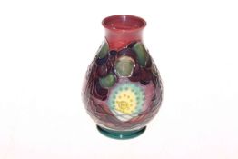 Moorcroft vase decorated with fruit and leaf design, mark on base,