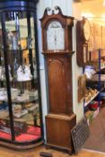 Antique oak 30 hour longcase clock having fruit painted arched dial, signed W.