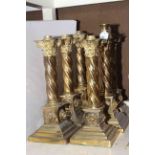 Six brass corinthian twist column oil lamp bases each with lion masks
