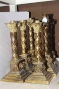 Six brass corinthian twist column oil lamp bases each with lion masks