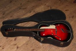 1960's acoustic guitar and case,