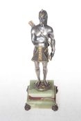 Silvered and gilt bronze Egyptian figure on a onyx base,