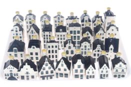 Collection of thirty one KLM blue Delft 'Bols' houses